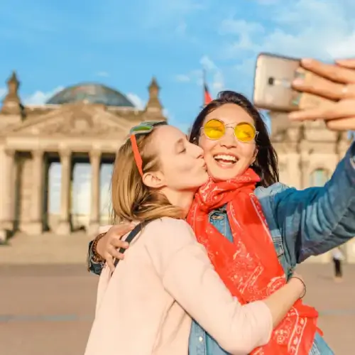 Couple on vacation in Berlin with travel insurance for couples