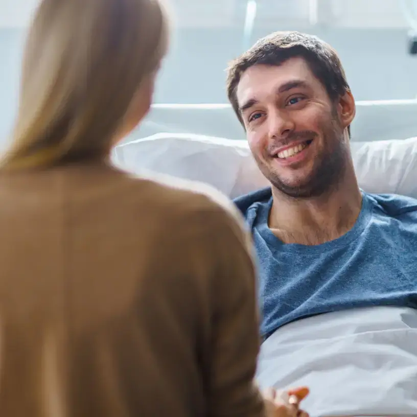 Couple talking after successful day surgery