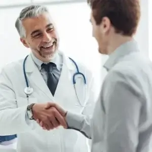 Doctors discussing Medicare cover