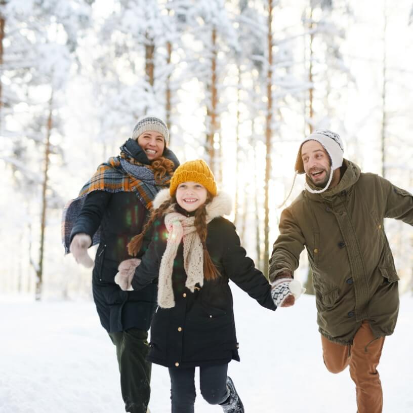 Happy family on a snow trip