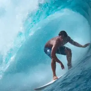 Man surfing a wave