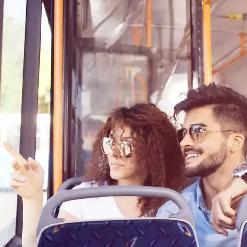 Tourist couple on bus with cancellation cover