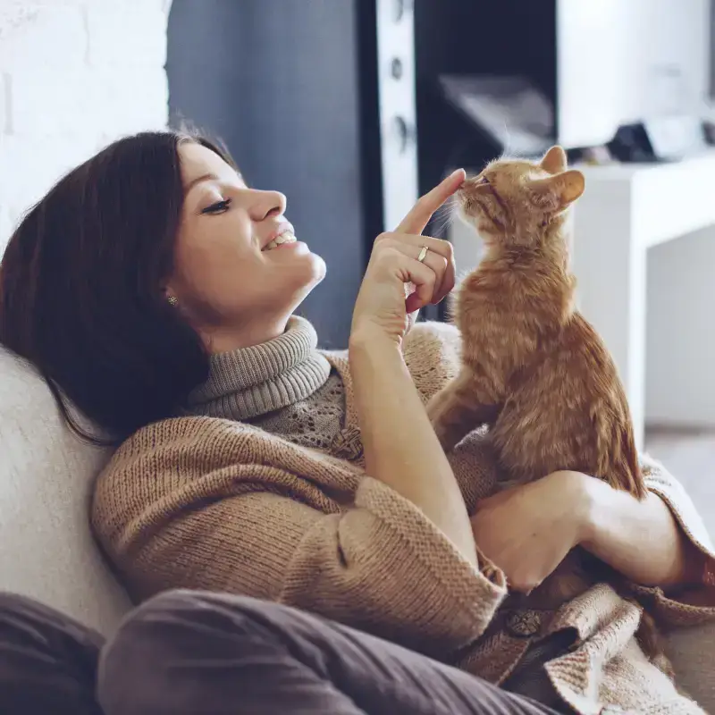 Woman holding a kitten