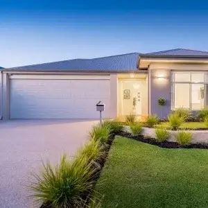 Street view of an Australian home at dusk.