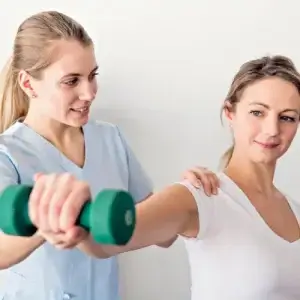 physiotherapist and patient work together after extras reset