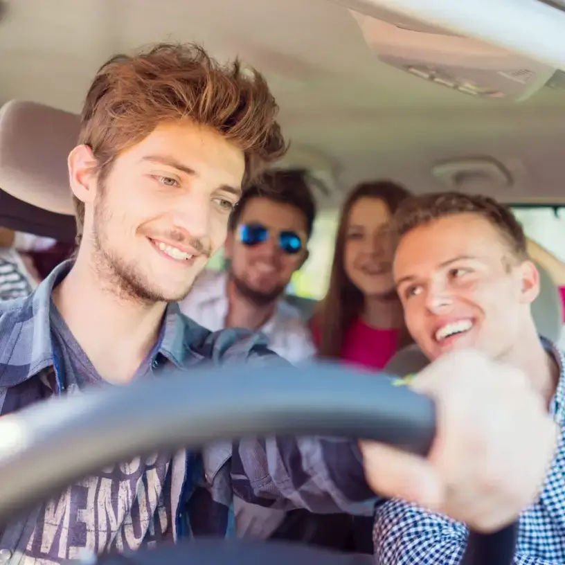 A group of young friends in a car.