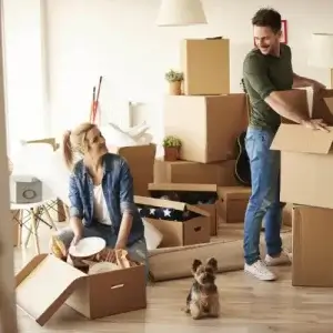 Family moving house with dog