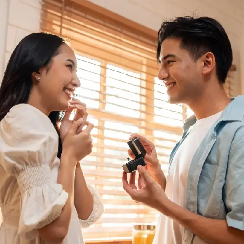 Man proposing to happy girlfriend