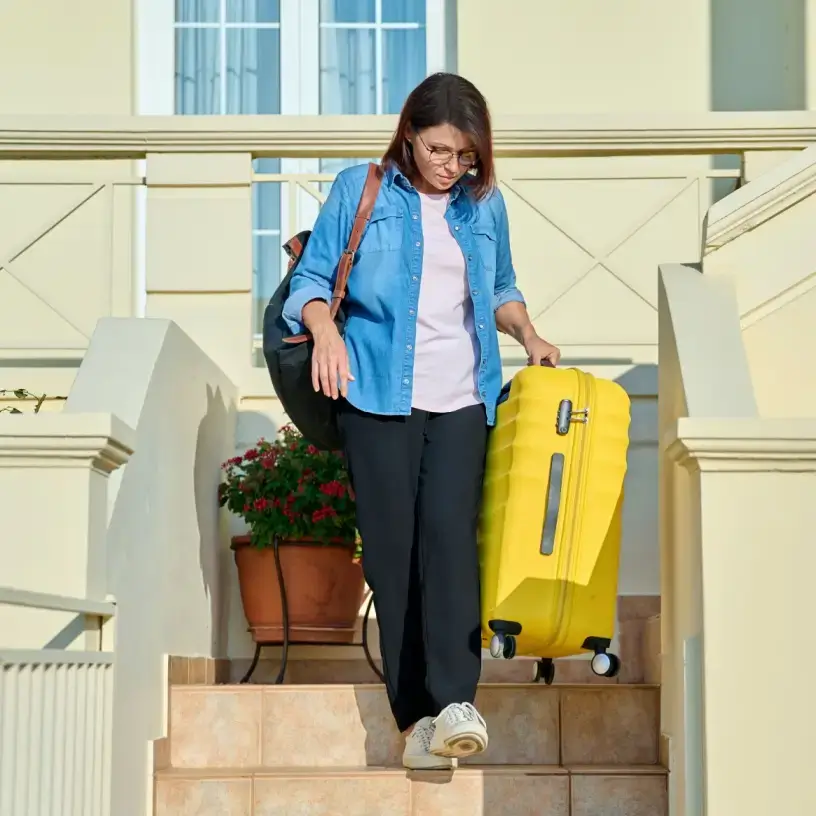 woman going on holiday unoccupied home