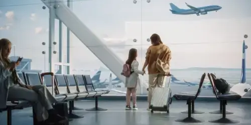 A woman and her daughter at the airport.