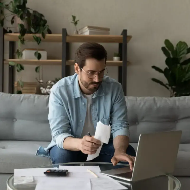 Man looking at gas bill