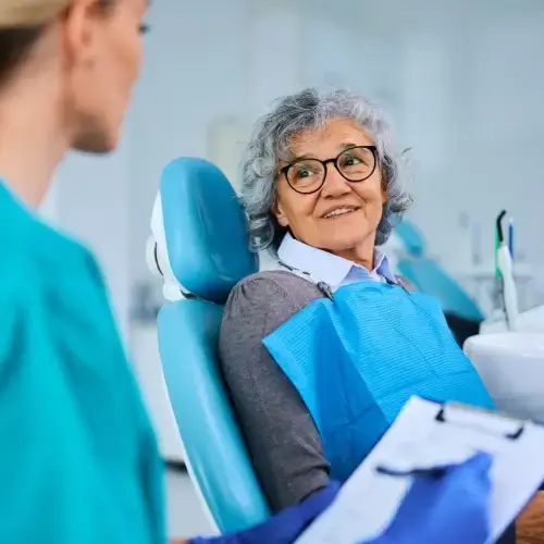 Senior female patient in the dentist chair