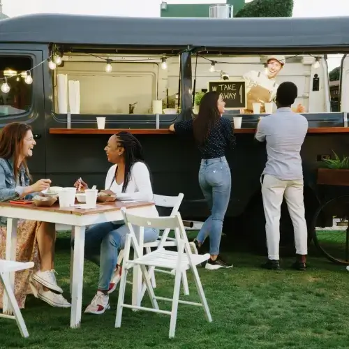 Customers gathering at a food truck