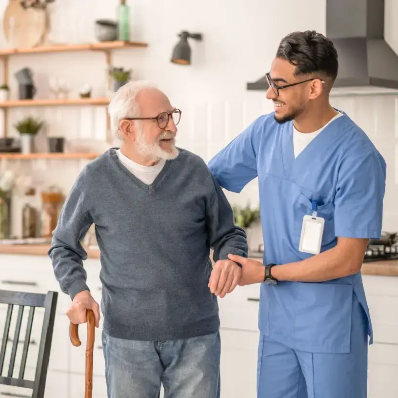 Support worker helping elderly patient