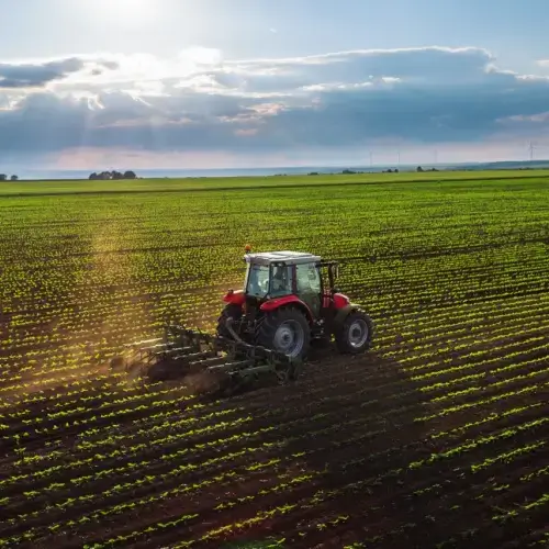 Tractor driving through a field