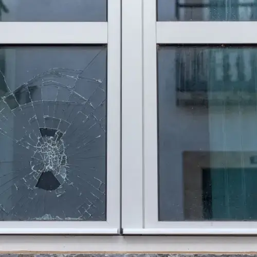 A broken house window.