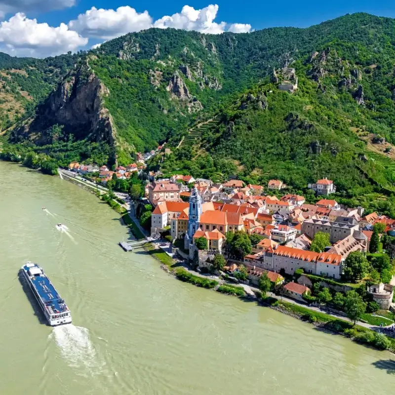 River Cruise Sailing Down the Danube River