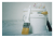 bucket of white paint and paint brush