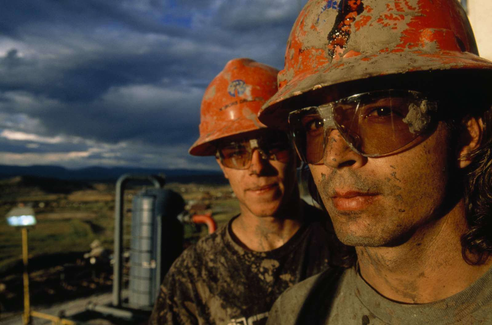 oil workers covered in mug