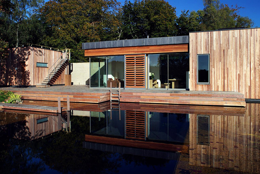 wooden house on a lake