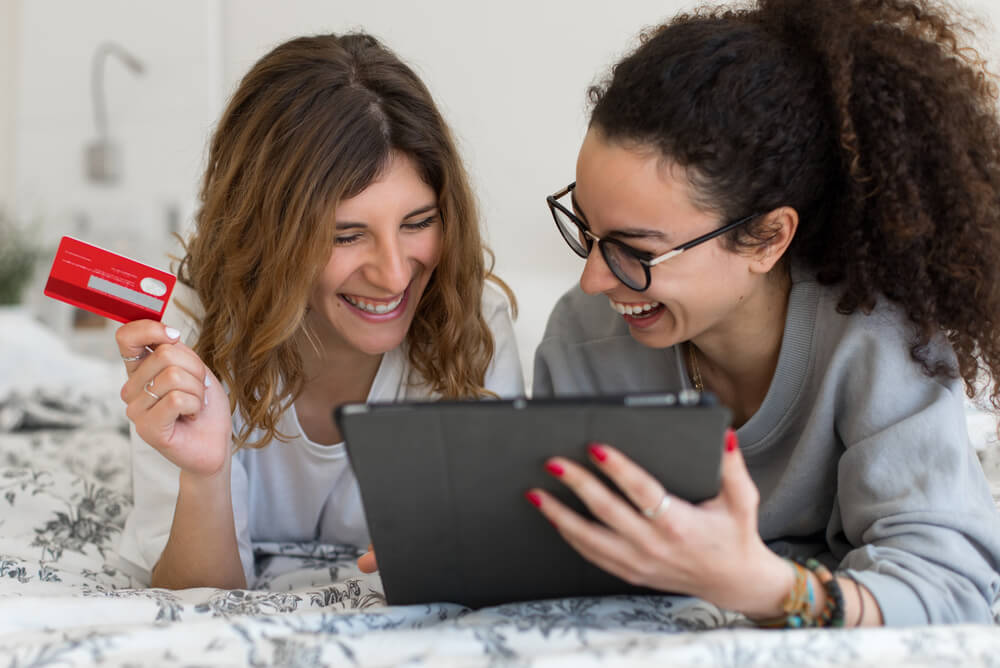 Couple making secure credit card payment online