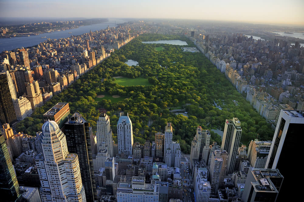 Central Park aerial view, Manhattan, New York; Park is surrounded by skyscraper