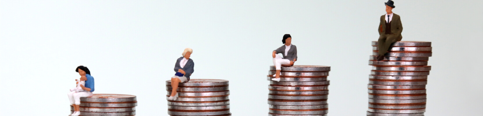 Miniature figures sit on piles of coins
