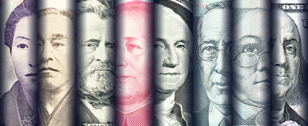 faces of famous leader on banknotes