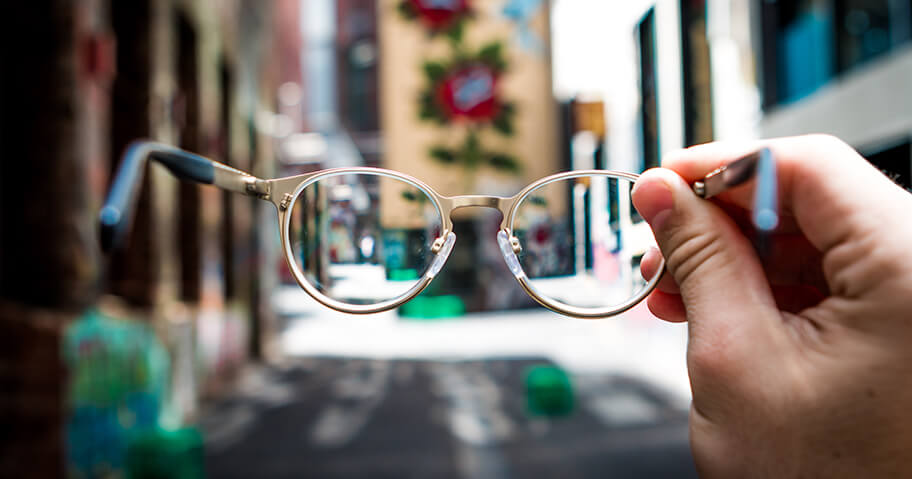 Holding up glasses