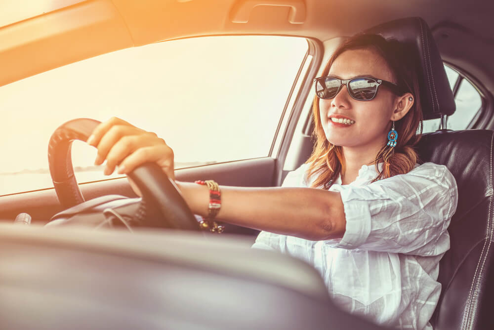 a woman driving a car