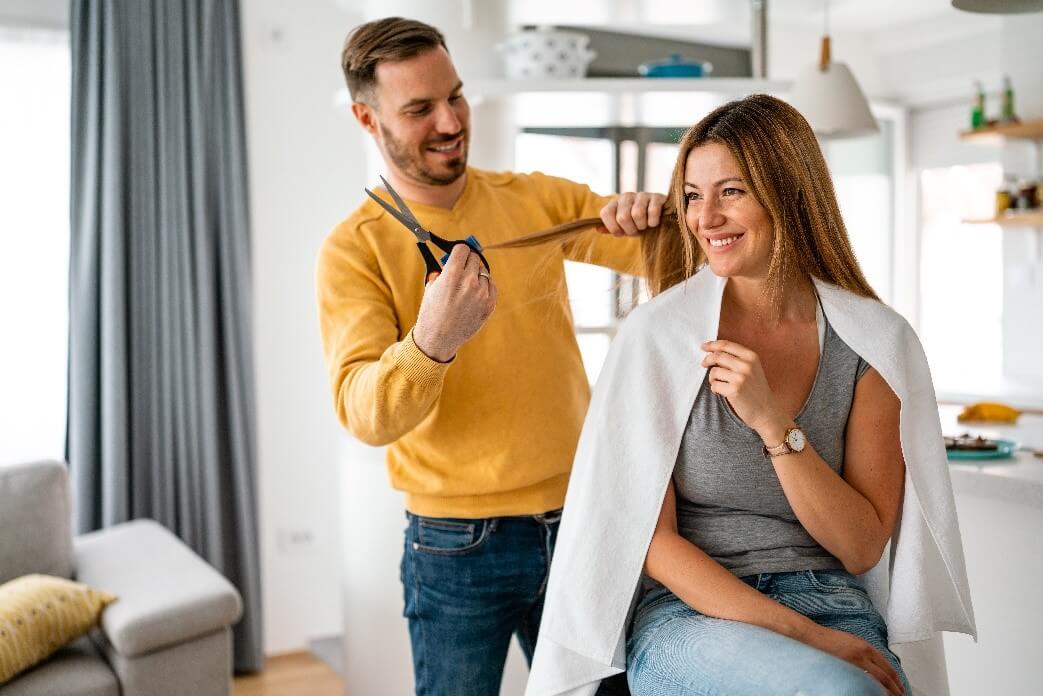 Trending quarantine activities: Couple cutting eachother's hair at home