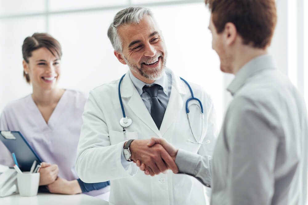 A doctor discussing Medicare cover
