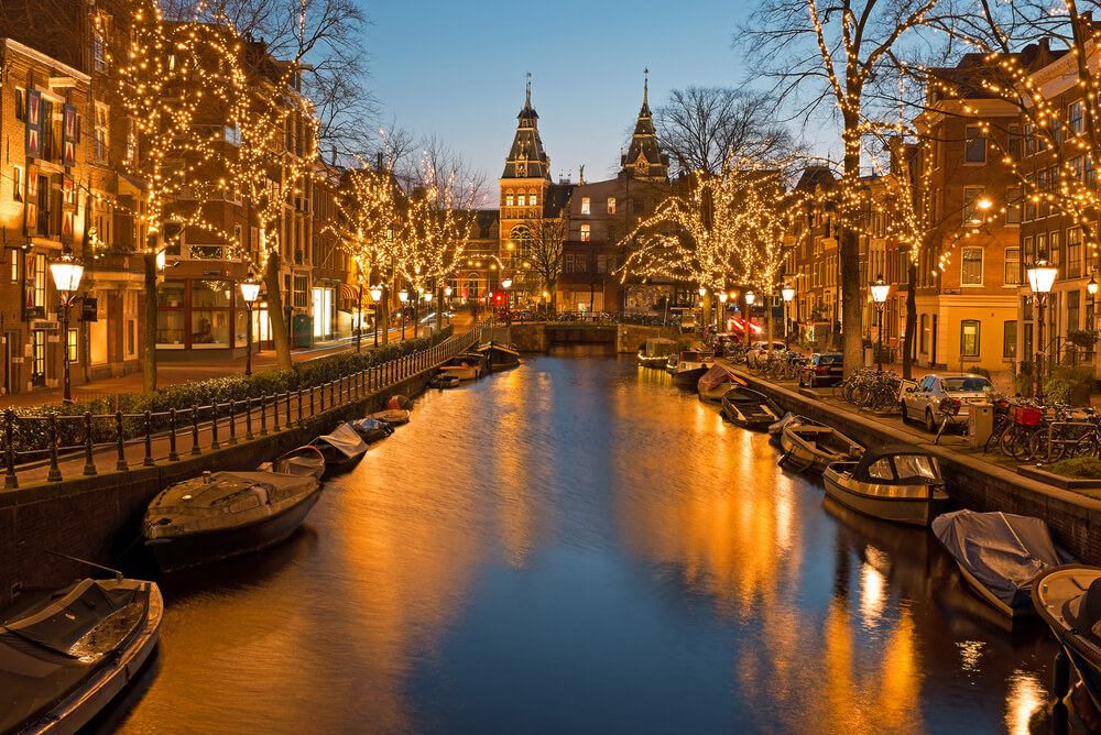 Christmas time in Amsterdam with the Rijksmuseum in Netherlands at twilight