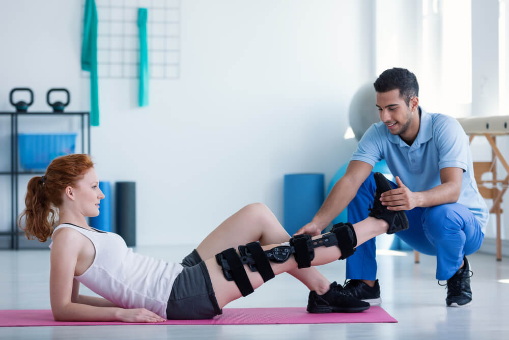 Occupational therapist working with client