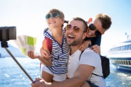 father and children on a cruise