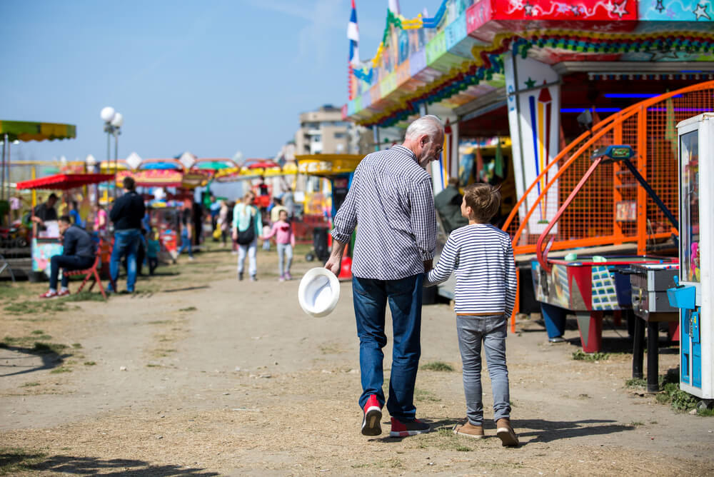 Grandfather and grandson at a local fair.