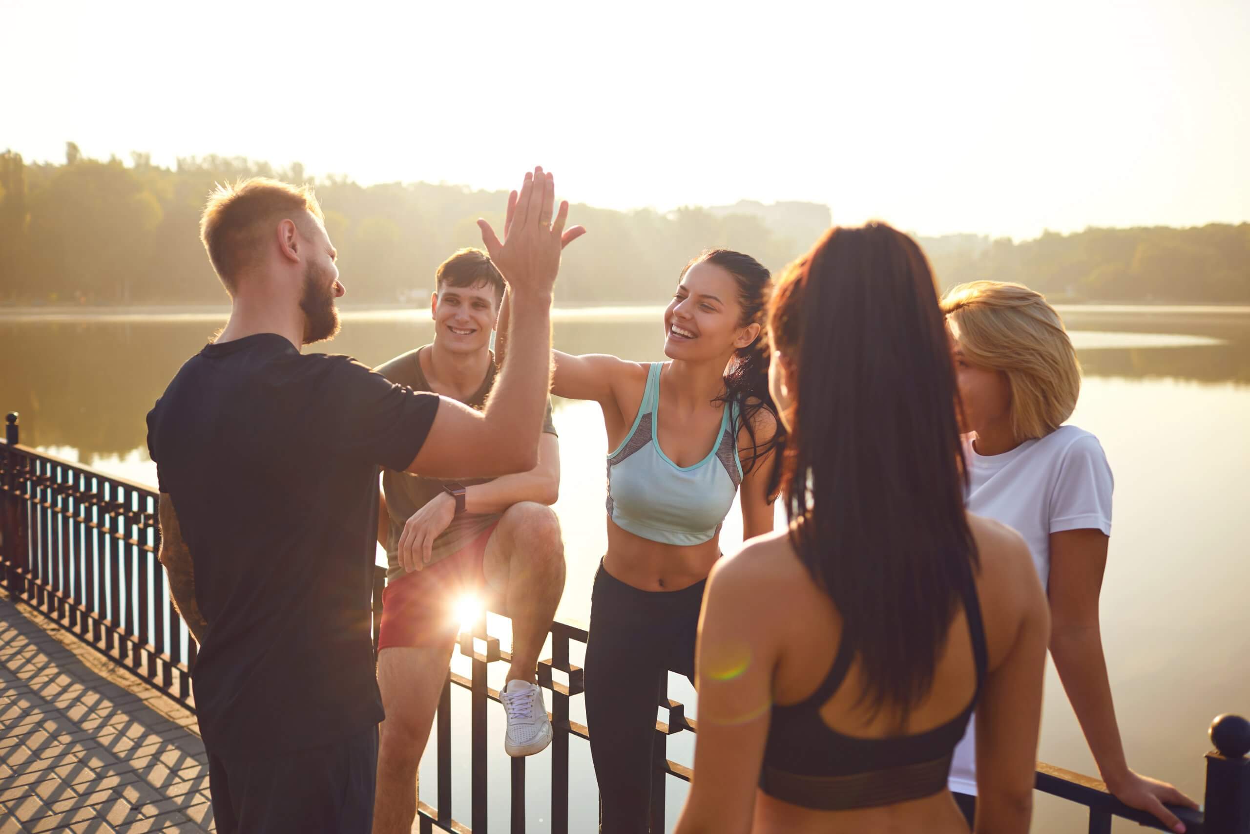 group-yoga-high-fiving