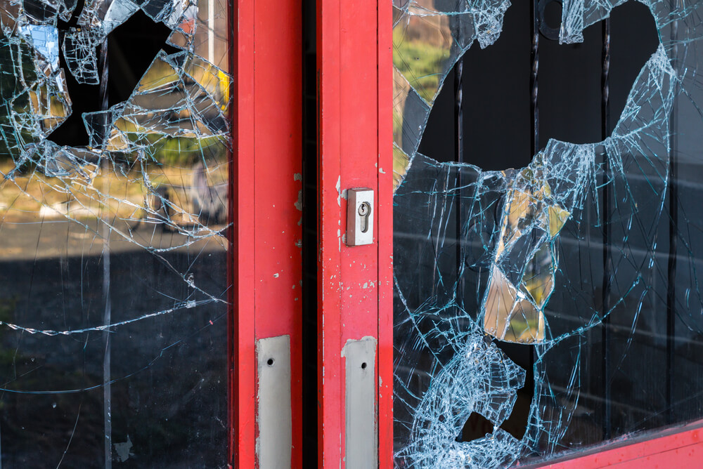 Shop front with smashed glass