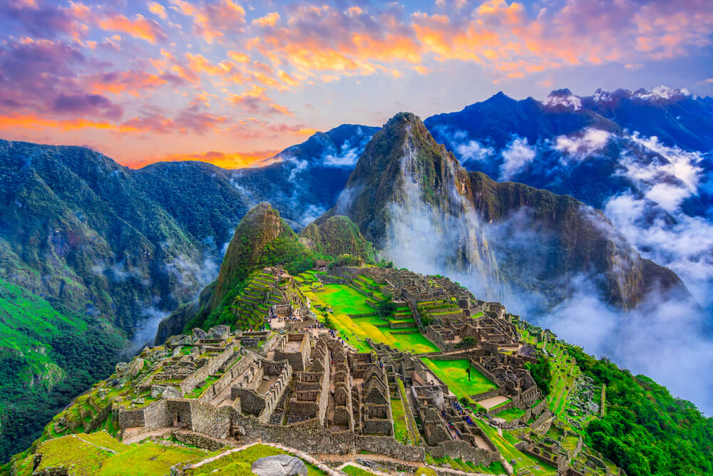 view of Machu Picchu at sunset