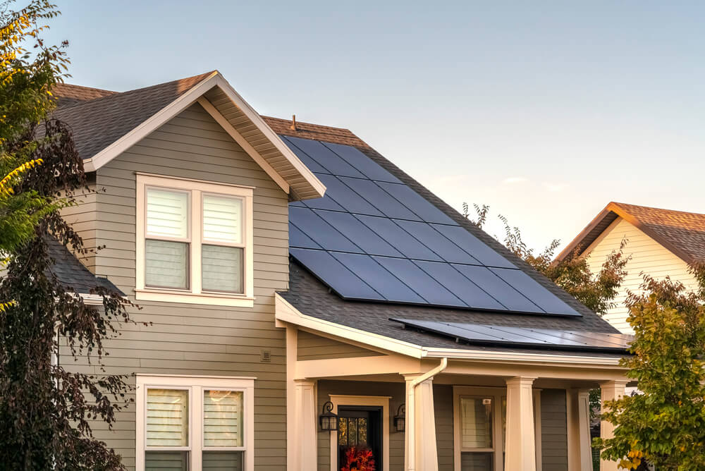 a house with solar panels on the roof