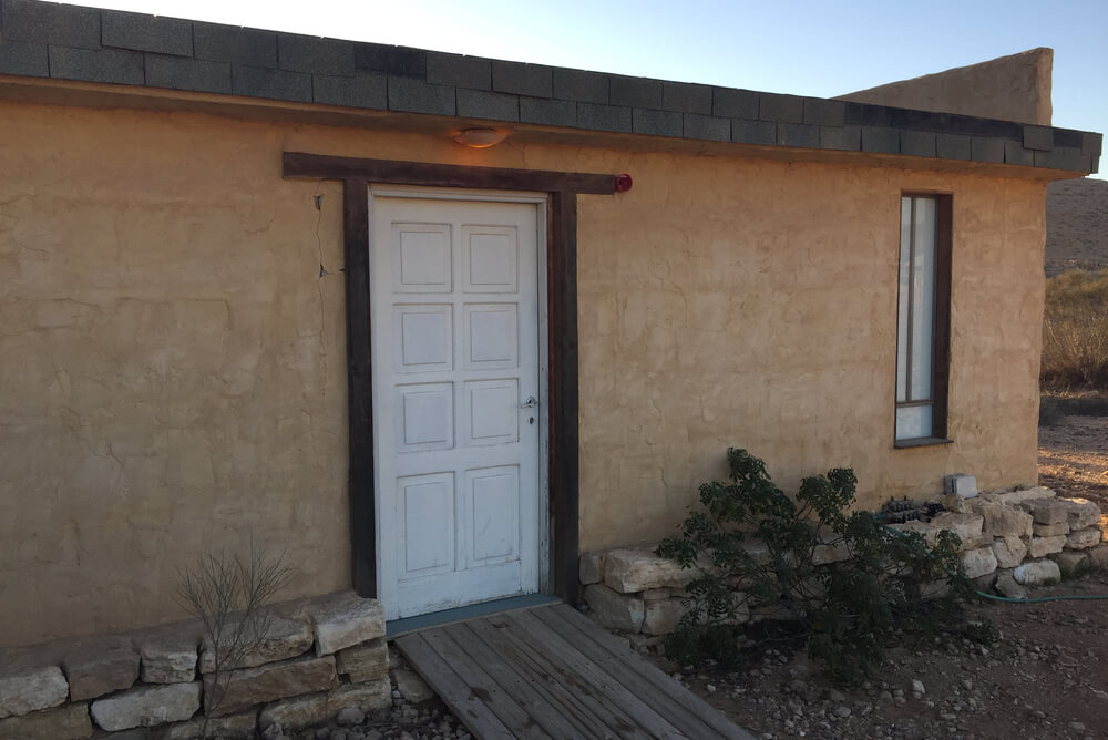 a mud brick house in the Outback