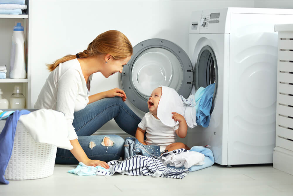 washing machine used by mother and child
