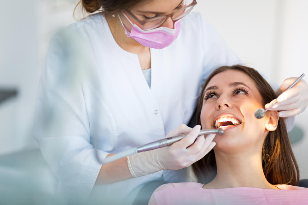 woman-at-dentist-happy