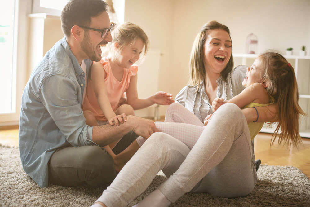 family celebrating after saving electricity