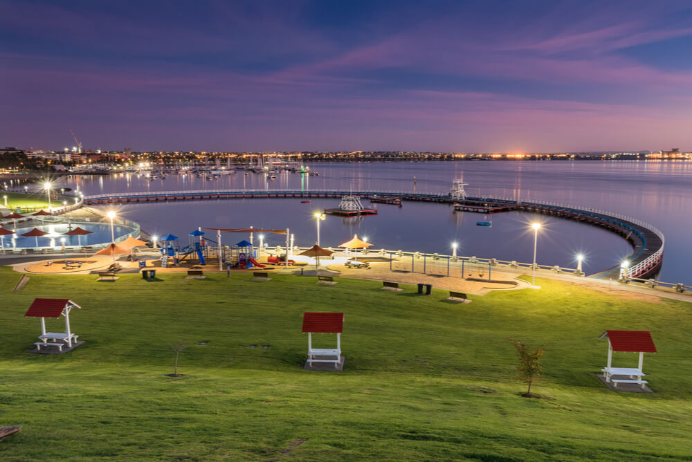 Dusk view of the city of Geelong lit up with electricity