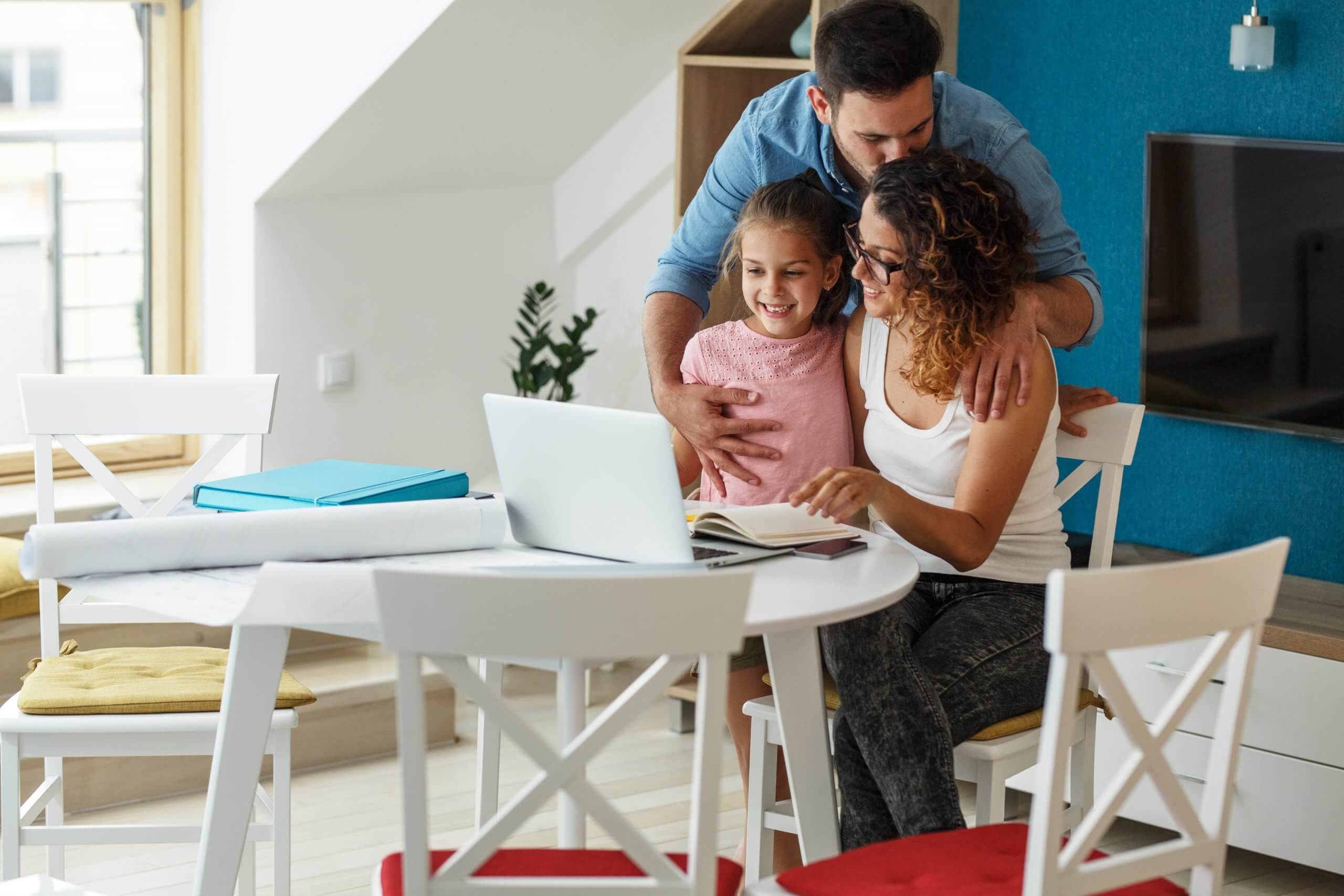 Family reviewing their standing offer electricity bills