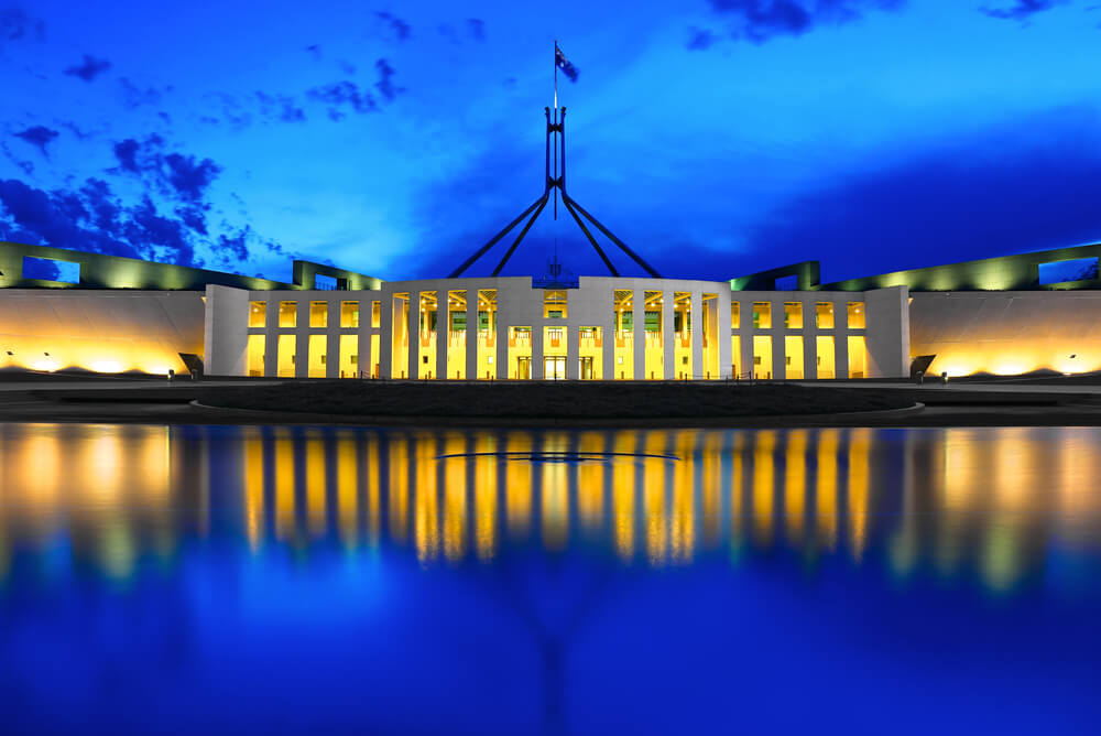 parliament house at twilight representing cheapest electricity canberra act