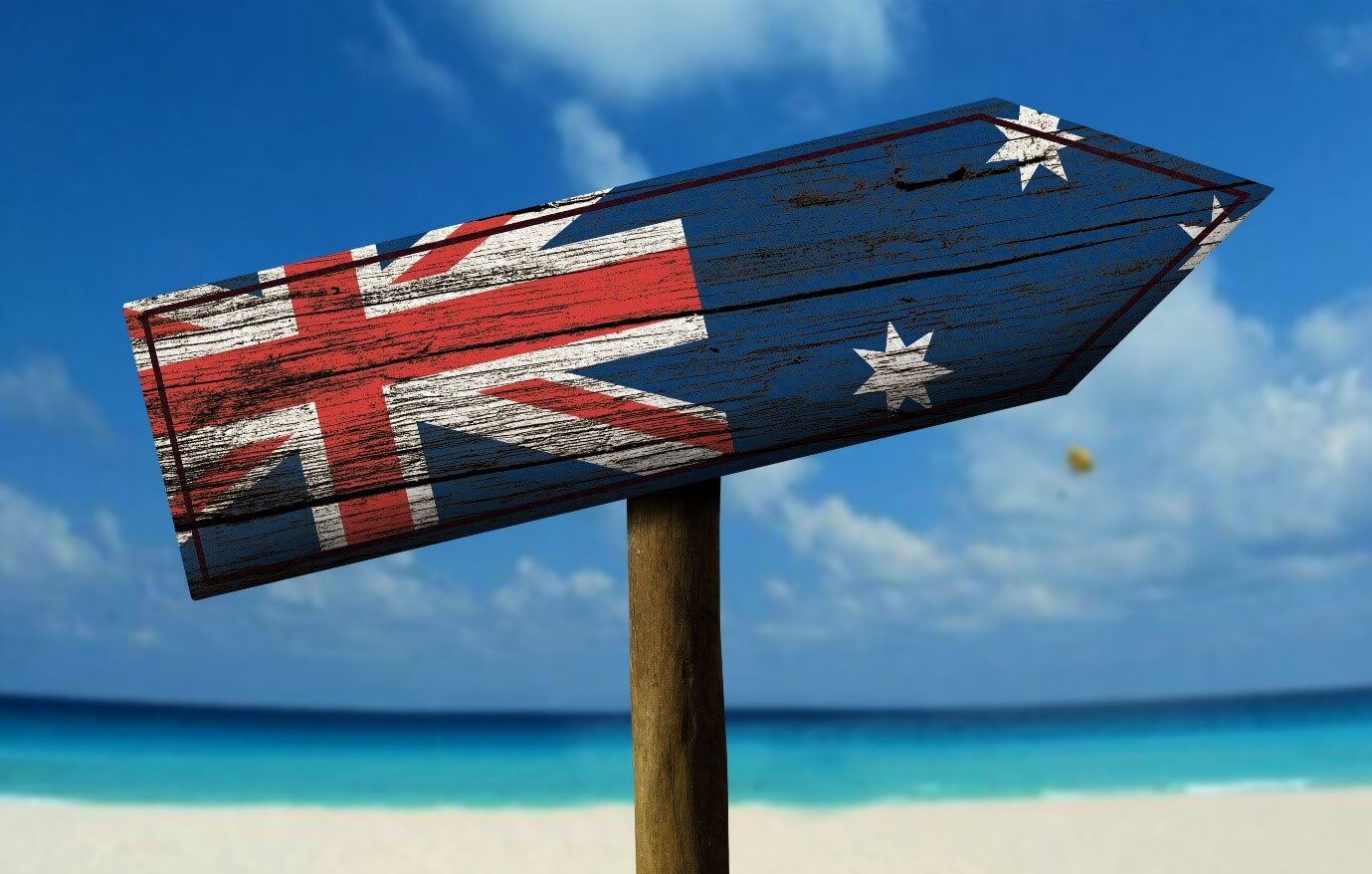 An Australian flag on a wooden sign