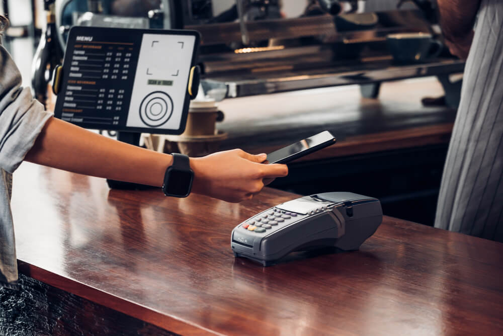 man paying digital wallet