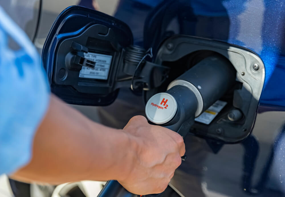 a hydrogen car being refuelled